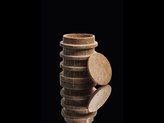 The Travertine Vessel embodies the epitome of luxury and sophistication elevating any space it graces. Its organic, raw surface captures the essence of naturalism, making it an alluring focal point for any discerning eye.